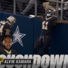 Kamara scoring a touchdown